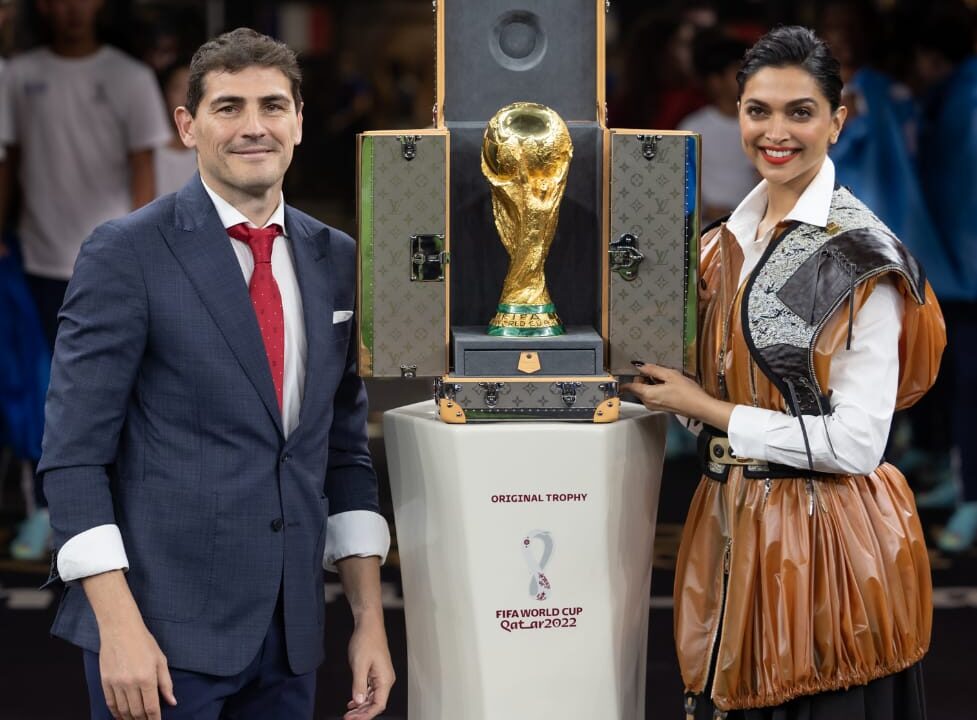 Deepika Padukone wears Louis Vuitton while presenting the FIFA World Cup Trophy in its Louis Vuitton Trunk at the FIFA World Cup Final Match